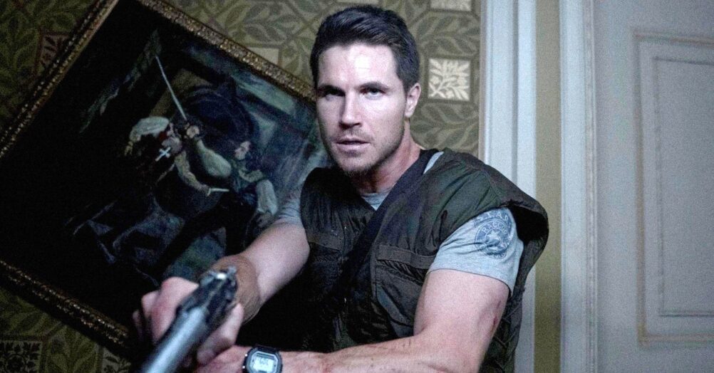 Chris Redfield is stuck in a dark room with some zombies in a clip from the Resident Evil reboot Resident Evil: Welcome to Raccoon City.