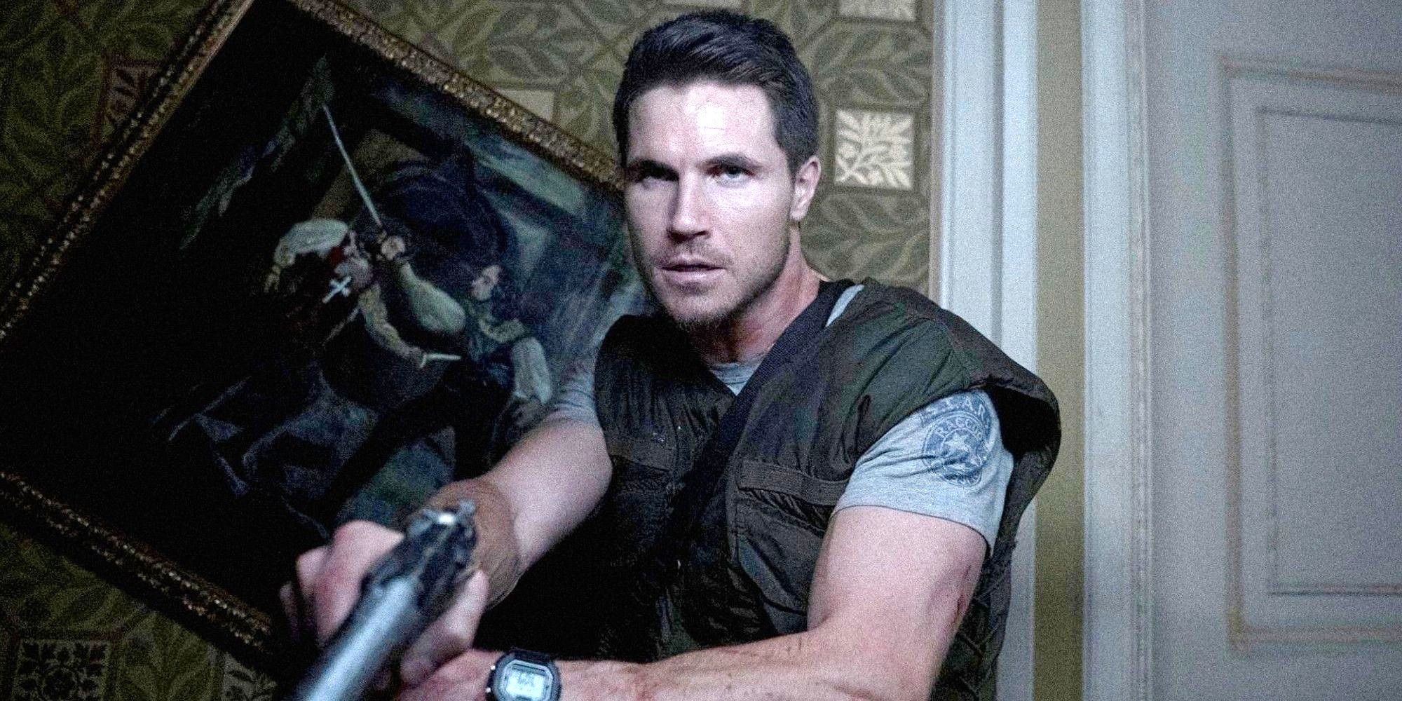 Chris Redfield is stuck in a dark room with some zombies in a clip from the Resident Evil reboot Resident Evil: Welcome to Raccoon City.