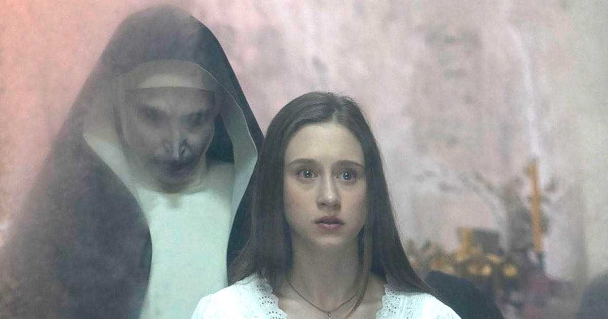 The Nun 2 image surrounds Taissa Farmiga with faceless evil