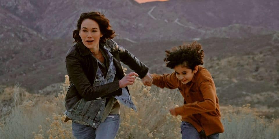 Lena Heady and Dean Scott Vasquez run from the bad guys in 9 Bullets.
