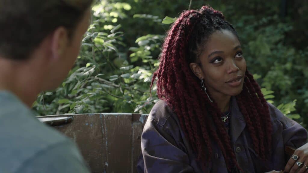 Naomie Ackie day dreams with Will Poulter in The Score (2021).