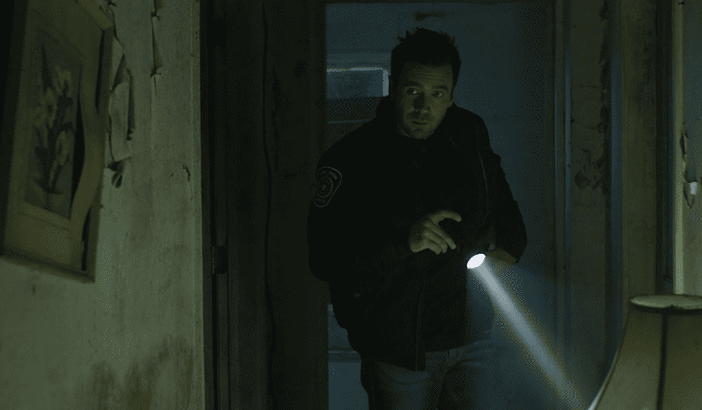 Allan Hawkco investigates a strange murder in The Breach (2022).