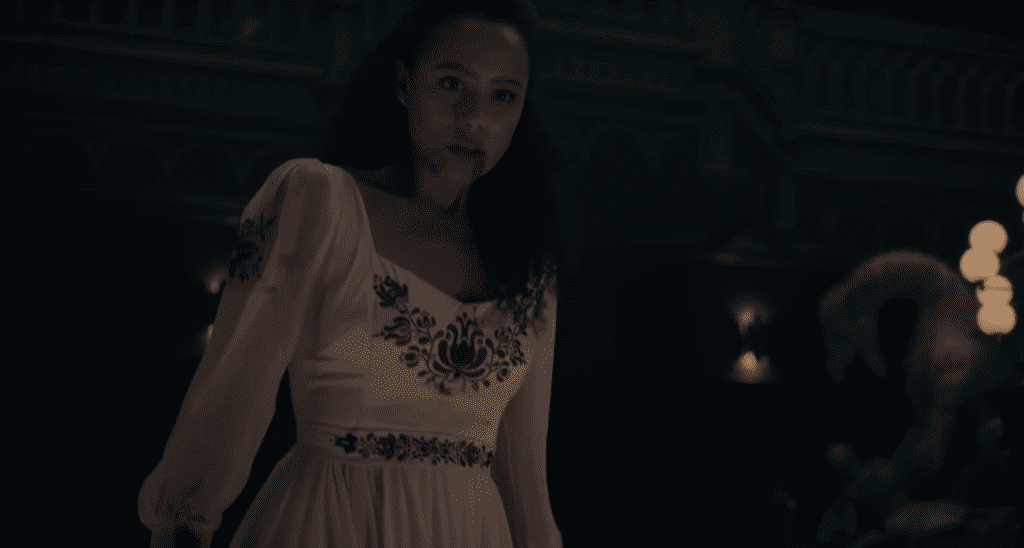 Nathalie Emmanuel looks in horror in The Invitation (2022).