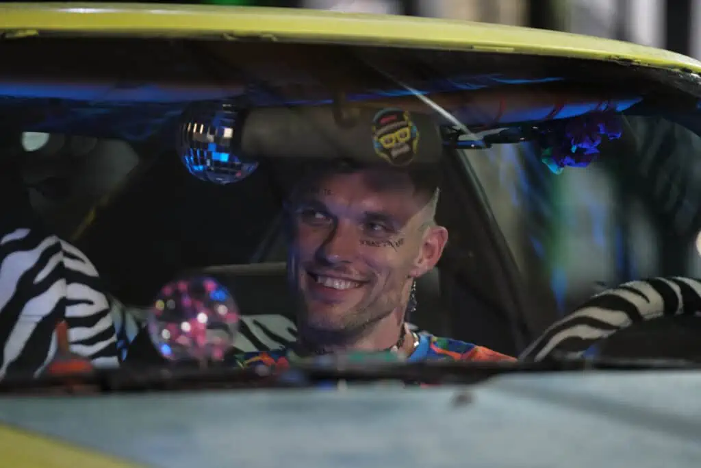 Ed Skrein smiles in Mona Lisa and the Blood Moon (2022).