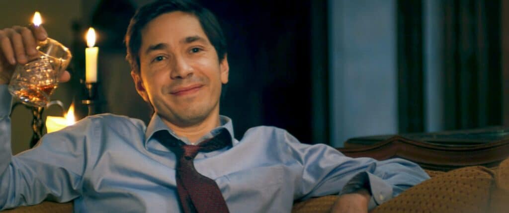 Justin Long has no idea what he's in for in House of Darkness (2022).