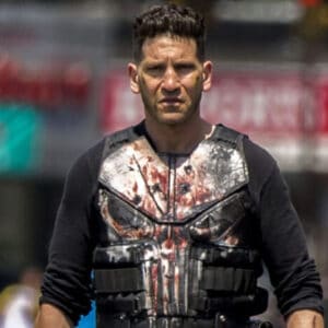 SPOILER-filled images from the set of Daredevil: Born Again reveal the Punisher skull logo and another costumed vigilante