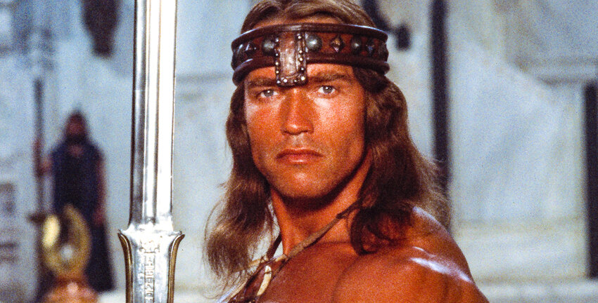 Arnold promotes new book with Conan the Barbarian sword