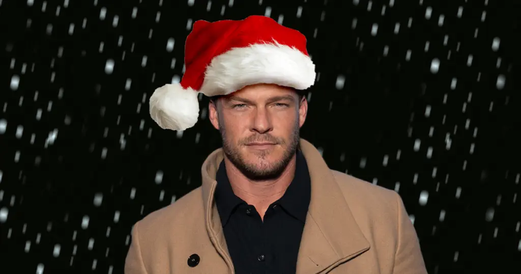 alan ritchson, man with a bag