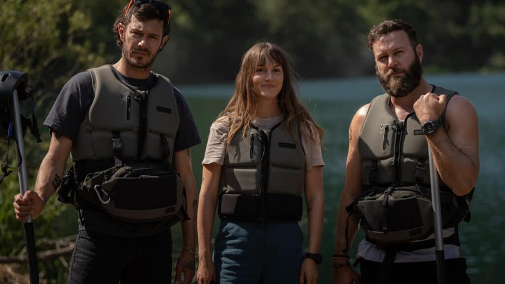 Adam Brody, Leighton Meester, and Taran Killam in The River Wild (2023).
