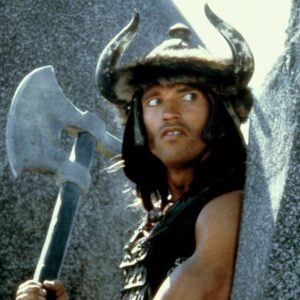Arnold Schwarzenegger says Conan the Barbarian director John Milius had him do some terrible stuff while filming the 1982 classic