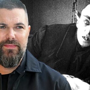 A new image from writer/director Robert Eggers' remake of Nosferatu features Nicholas Hoult and a hint of Count Orlok
