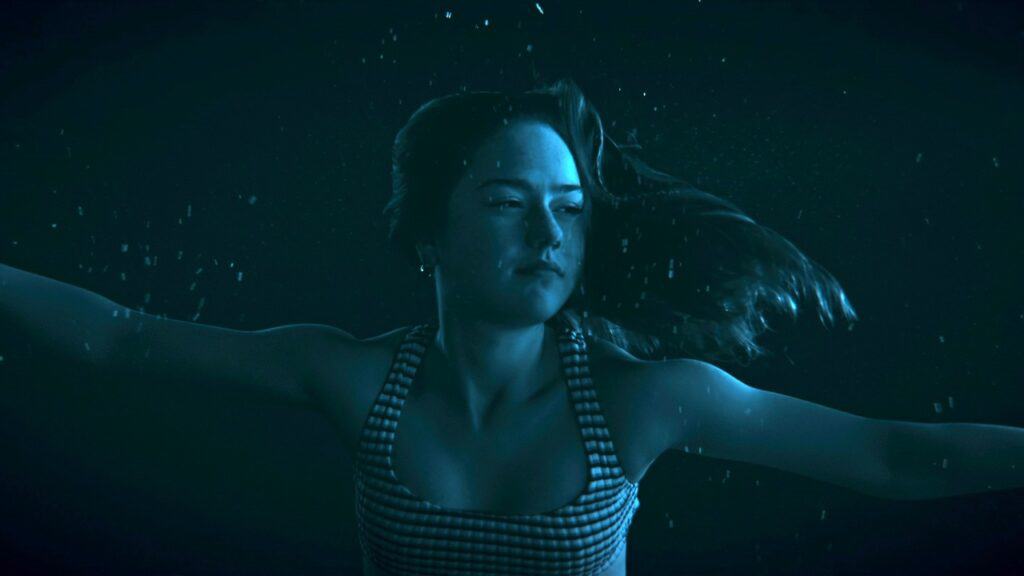 Amélie Hoeferle goes for a dip in Night Swim (2024).