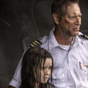 A first look image from Renny Harlin's shark thriller Deep Water shows Aaron Eckhart (accompanied by Molly Wright)