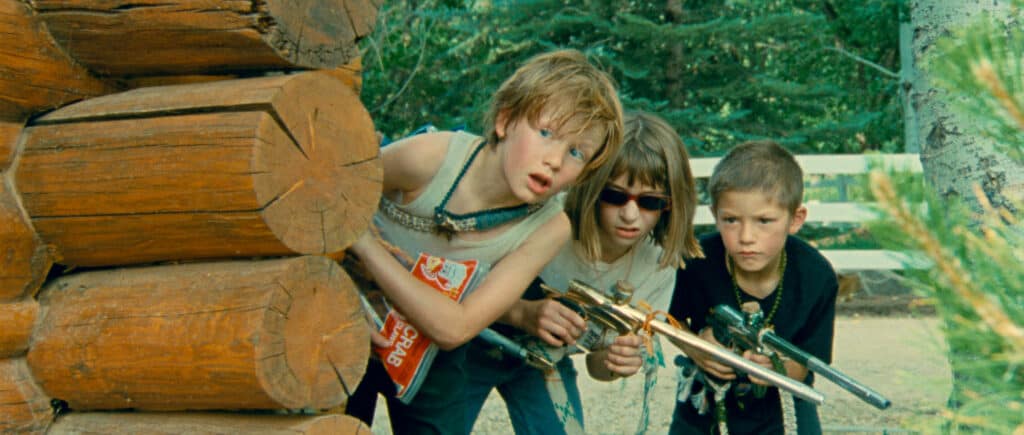 Charlie Stover, Phoebe Ferro, and Skyler Peters in Riddle of Fire (2024).