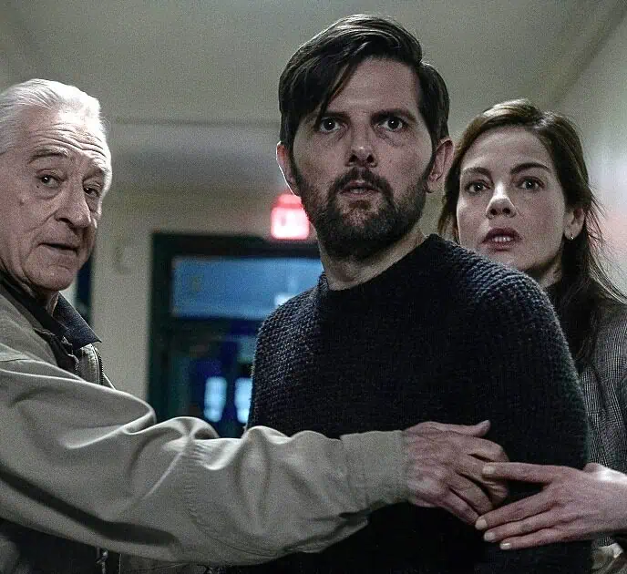 Images show Michelle Monaghan, Adam Scott, and Robert De Niro in the Netflix serial killer thriller The Whisper Man