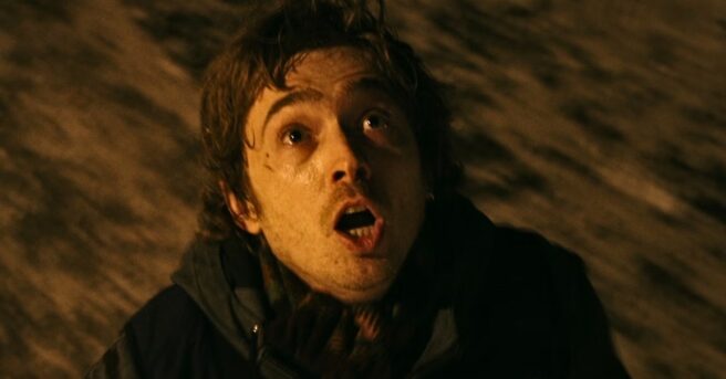 A new Resident Evil clip shows Austin Abrams running from zombies in a bloody and funny sequence from the Zach Cregger film